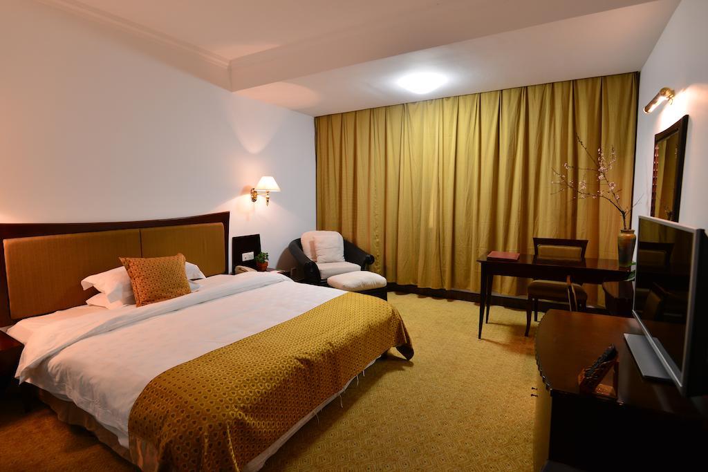 Baodao Exhibition Center Hotel Wuyishan  Rum bild