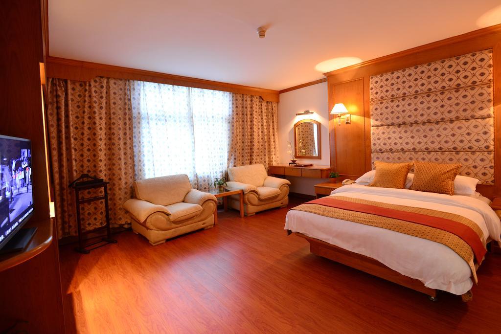 Baodao Exhibition Center Hotel Wuyishan  Rum bild