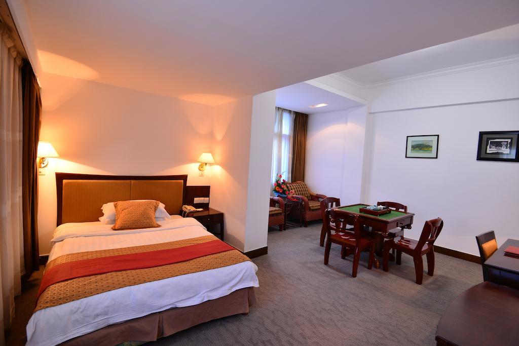 Baodao Exhibition Center Hotel Wuyishan  Rum bild