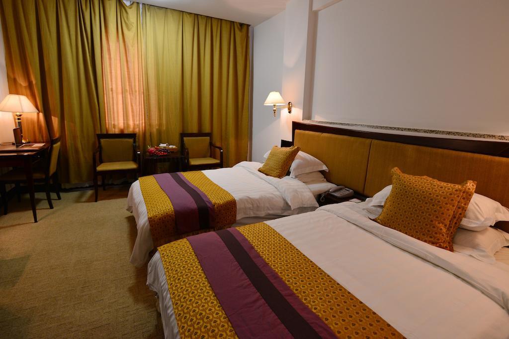 Baodao Exhibition Center Hotel Wuyishan  Rum bild