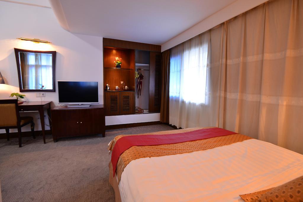 Baodao Exhibition Center Hotel Wuyishan  Rum bild